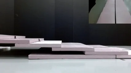 Quadruped with variable-stiffness tail
